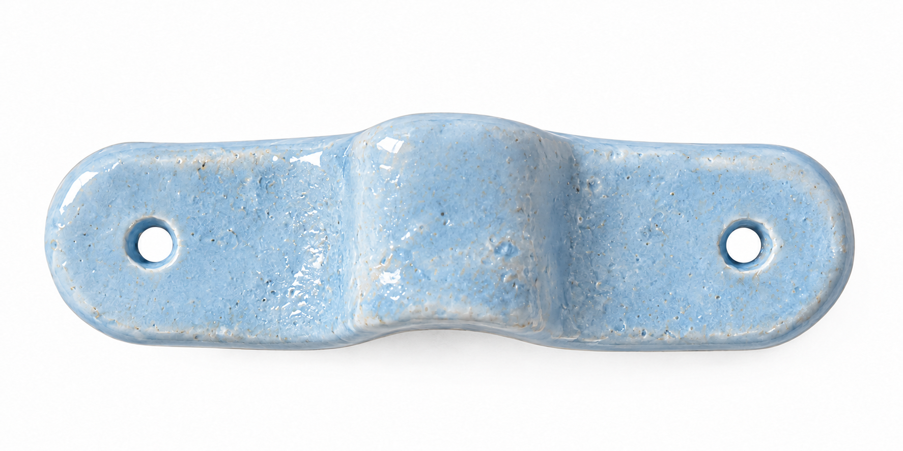 Single handmade ceramic drawer pull with a light blue finish