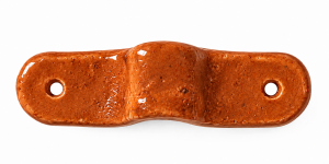 Single handmade ceramic drawer pull with an orange terracotta coloured finish