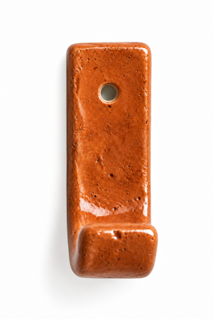 Single ceramic wall hook with an orange terracotta coloured finish