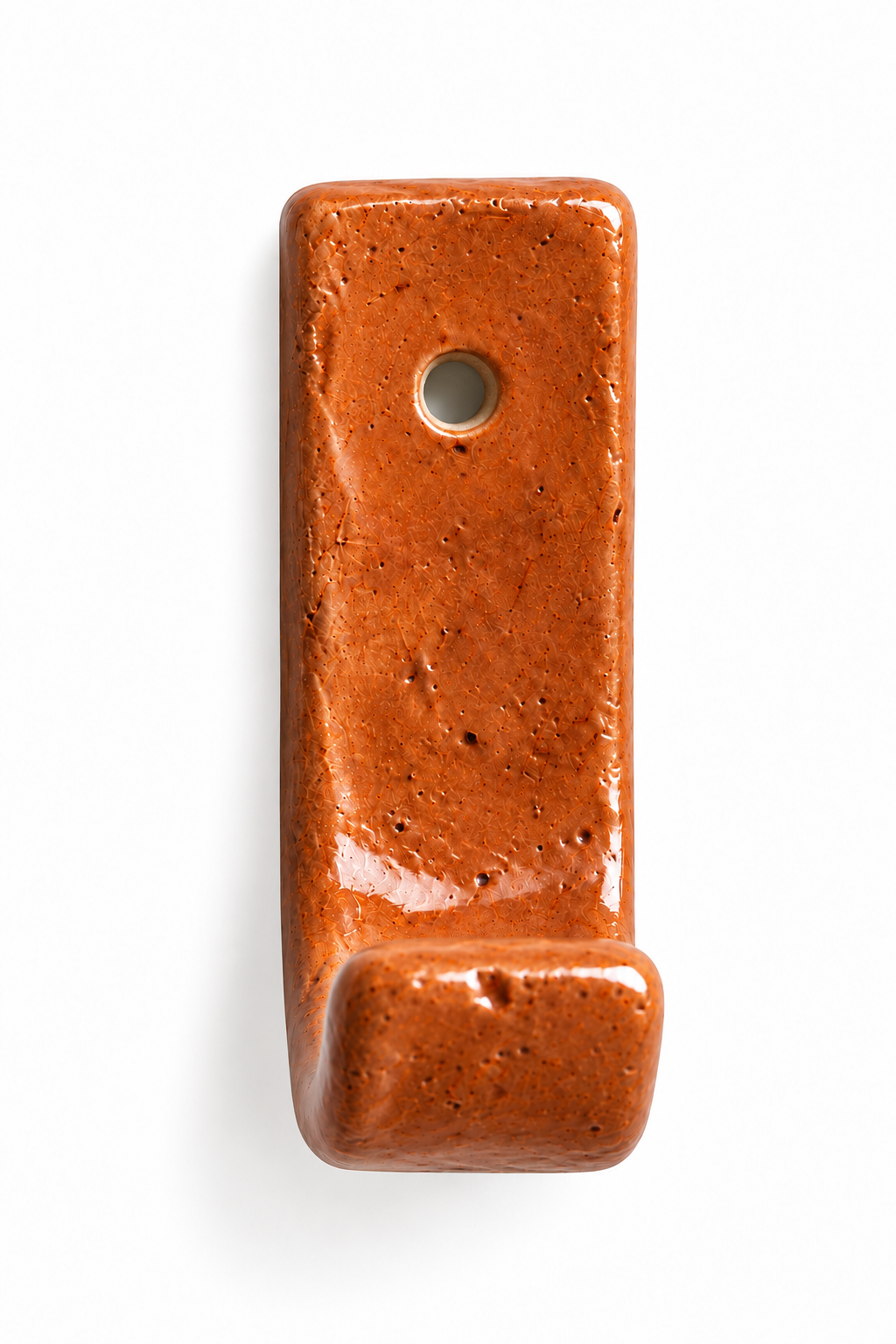 Single ceramic wall hook with an orange terracotta coloured finish