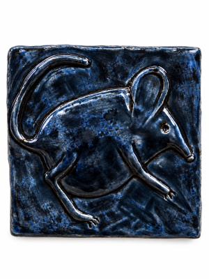 Mouse relief ceramic tile in a blue black glazed finish
