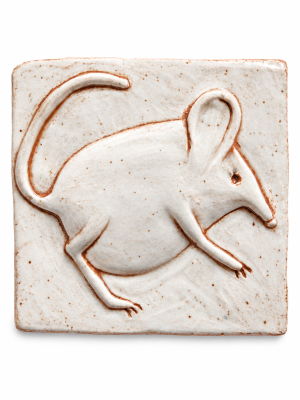 Mouse relief ceramic tile with a speckled pale glaze and terracotta relief lines