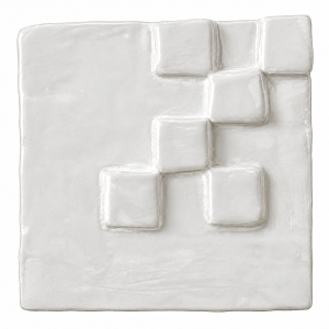 Stepped geometric relief ceramic tile in a glossy white finish