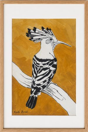 Black and white hoopoe with a raised crest against a golden ochre background, shown in a natural wood frame with a white mount